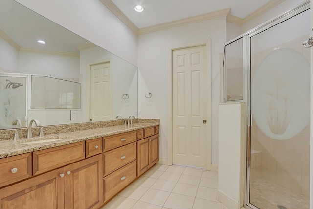 9400 Briarcliff Trce, Port Saint Lucie, FL 34986 - full bathroom featuring crown molding, a shower stall, tile patterned flooring, double vanity, and baseboards
