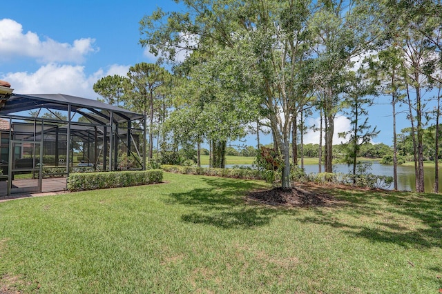 9400 Briarcliff Trce, Port Saint Lucie, FL 34986 - view of grassy yard with a water view and glass enclosure