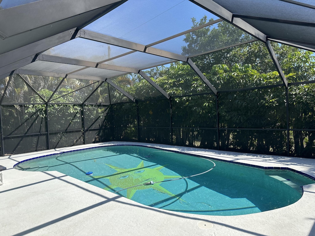 outdoor pool featuring a patio