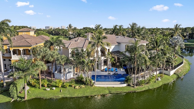 aerial view of property and surrounding area with a large body of water