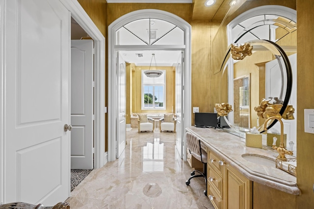 bathroom with marble tiled floors and vanity