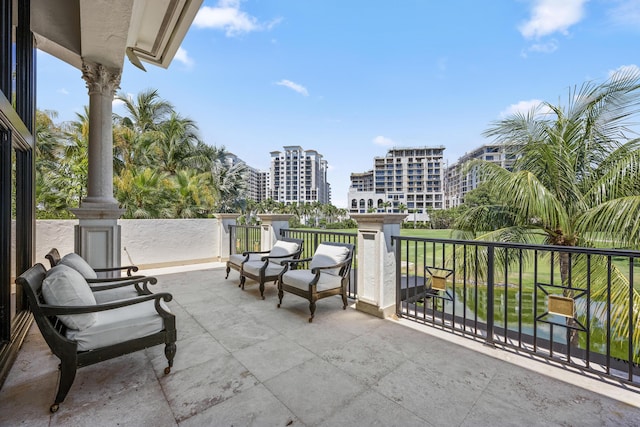 view of patio with a balcony