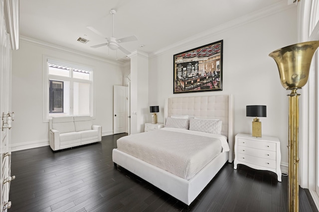 bedroom featuring ornamental molding, dark wood-style flooring, baseboards, and ceiling fan