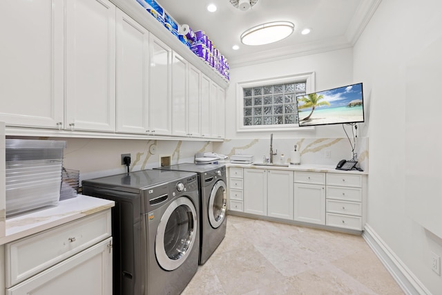 laundry area featuring cabinet space, washer and dryer, crown molding, recessed lighting, and light tile patterned floors