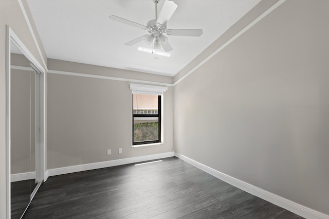 1010 Delray Lakes Dr, Delray Beach, FL 33444 - spare room with dark wood-style flooring, ceiling fan, and baseboards