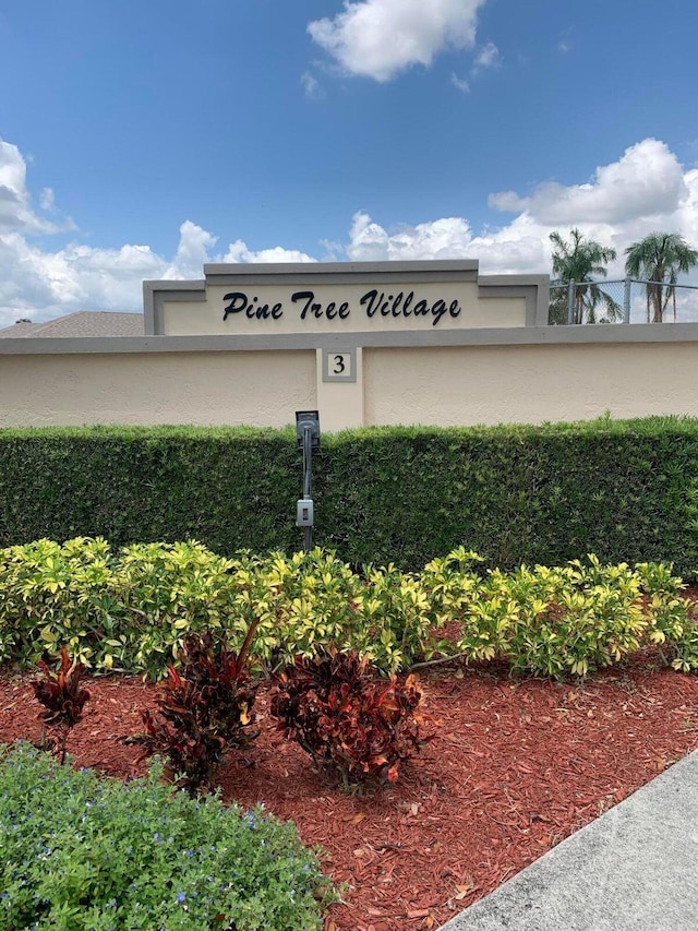 view of community sign