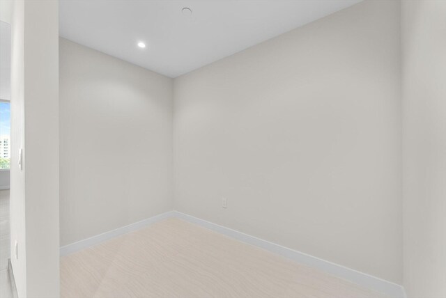 220 SE Mizner Blvd Unit 609, Boca Raton, FL 33432 - empty room with baseboards and recessed lighting