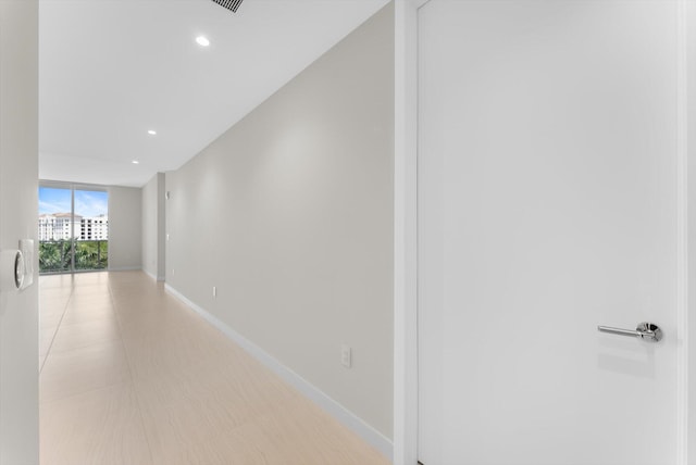 220 SE Mizner Blvd Unit 609, Boca Raton, FL 33432 - hall featuring baseboards and recessed lighting
