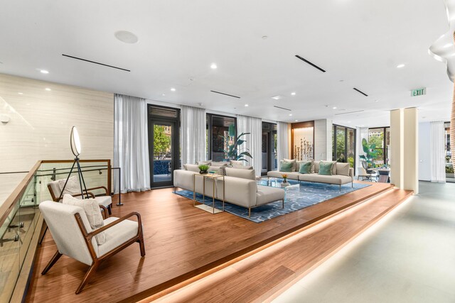 220 SE Mizner Blvd Unit 609, Boca Raton, FL 33432 - living room featuring plenty of natural light and recessed lighting