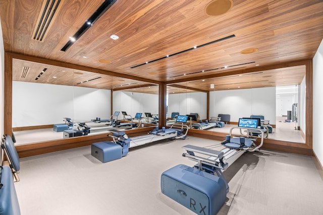 220 SE Mizner Blvd Unit 609, Boca Raton, FL 33432 - workout area featuring wood ceiling and carpet