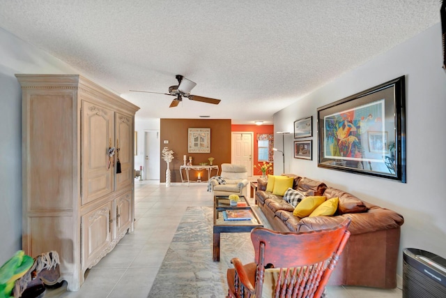 9152 Affirmed Ln, Boca Raton, FL 33496 - living area featuring a ceiling fan, a textured ceiling, and light tile patterned flooring