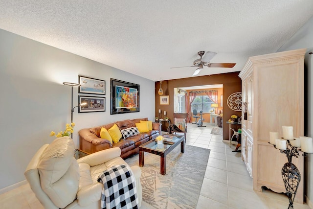 9152 Affirmed Ln, Boca Raton, FL 33496 - living area featuring ceiling fan, light tile patterned floors, and a textured ceiling