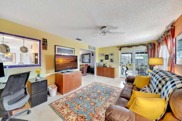 9152 Affirmed Ln, Boca Raton, FL 33496 - living area with a ceiling fan, light tile patterned floors, and a textured ceiling