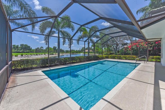 4054 SW Gleneagle Cir, Palm City, FL 34990 - swimming pool with a water view and a patio area
