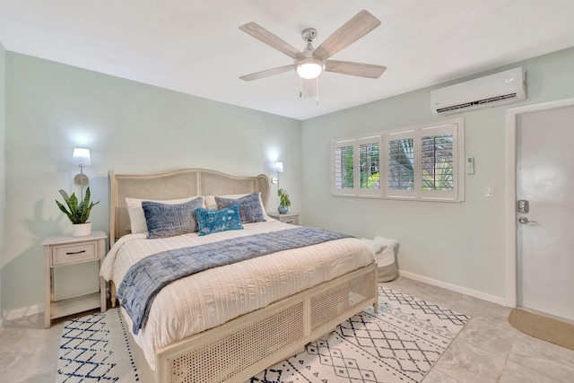 bedroom featuring a wall mounted AC, baseboards, light tile patterned floors, and a ceiling fan