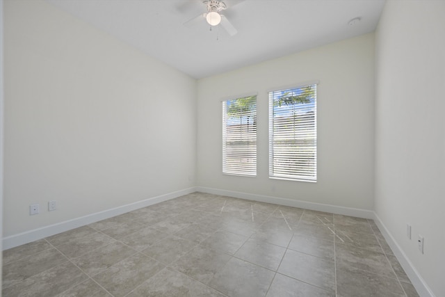 4641 Woodland Way, Westlake, FL 33470 - unfurnished room with a ceiling fan, baseboards, and light tile patterned floors