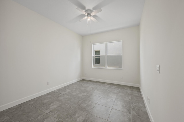 4641 Woodland Way, Westlake, FL 33470 - unfurnished room with ceiling fan, baseboards, and tile patterned flooring