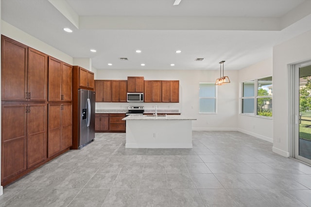 4641 Woodland Way, Westlake, FL 33470 - kitchen with stainless steel appliances, light countertops, recessed lighting, a sink, and hanging light fixtures