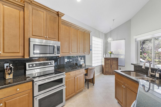 12341 NW 78th Mnr, Parkland, FL 33076 - kitchen with appliances with stainless steel finishes, a sink, vaulted ceiling, backsplash, and light tile patterned floors