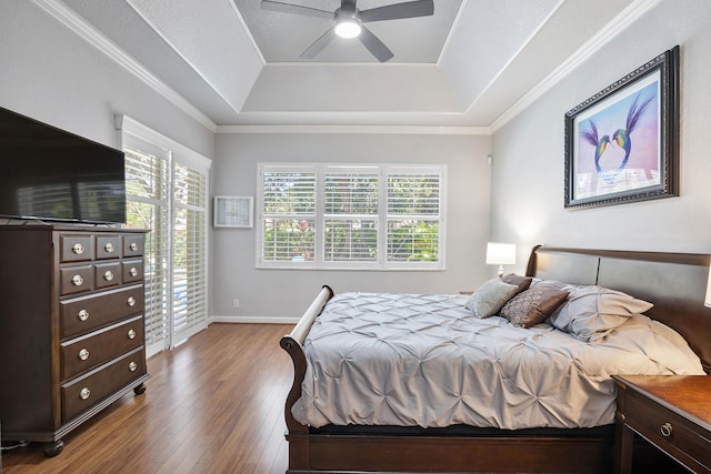 12341 NW 78th Mnr, Parkland, FL 33076 - bedroom with a raised ceiling, wood finished floors, ceiling fan, ornamental molding, and baseboards