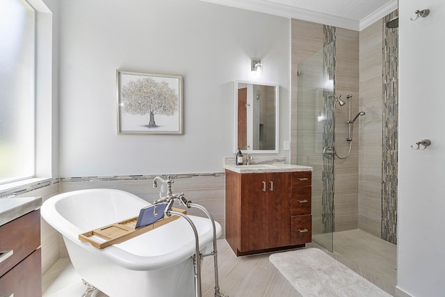 12341 NW 78th Mnr, Parkland, FL 33076 - full bathroom featuring tile walls, tiled shower, vanity, a soaking tub, and crown molding