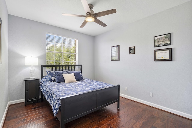 12341 NW 78th Mnr, Parkland, FL 33076 - bedroom with baseboards, dark wood-style flooring, and a ceiling fan