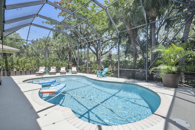 12341 NW 78th Mnr, Parkland, FL 33076 - view of pool with a patio and glass enclosure