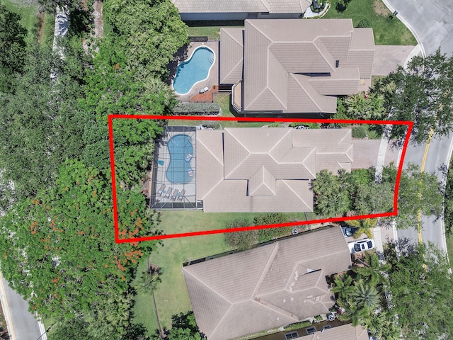12341 NW 78th Mnr, Parkland, FL 33076 - aerial view of property and surrounding area featuring a pool area and property boundaries highlighted