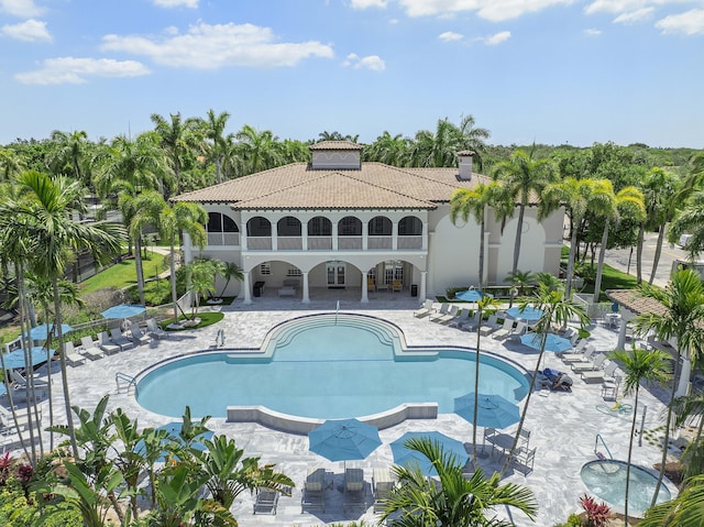 12341 NW 78th Mnr, Parkland, FL 33076 - community pool with a patio area