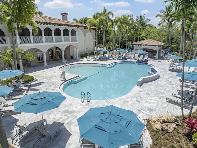 12341 NW 78th Mnr, Parkland, FL 33076 - community pool featuring a patio area and a gazebo
