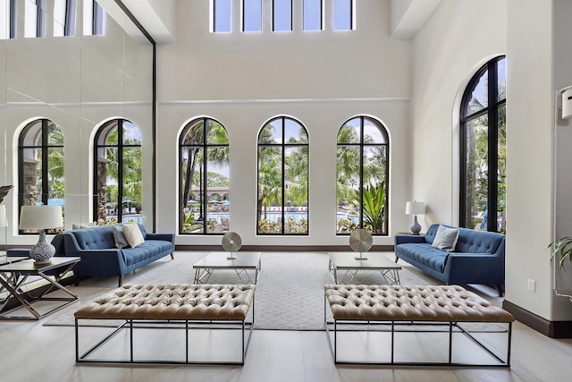 12341 NW 78th Mnr, Parkland, FL 33076 - living room with a high ceiling and a water view