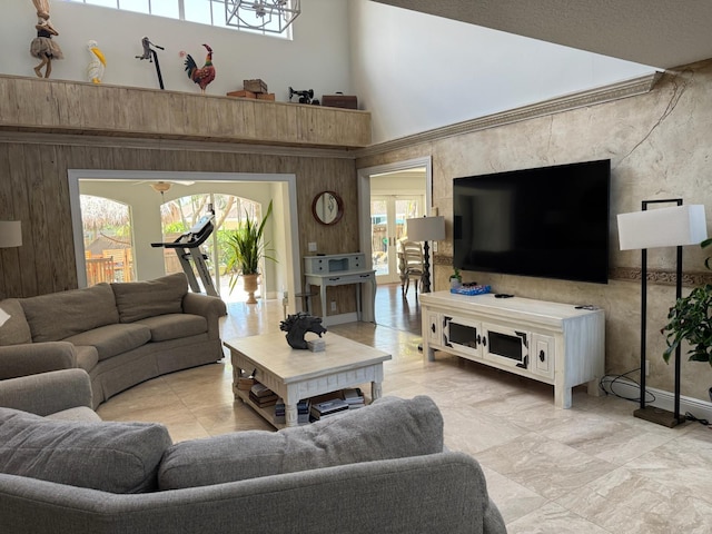 14324 Paddock Dr, Wellington, FL 33414 - living room featuring a high ceiling and wood walls