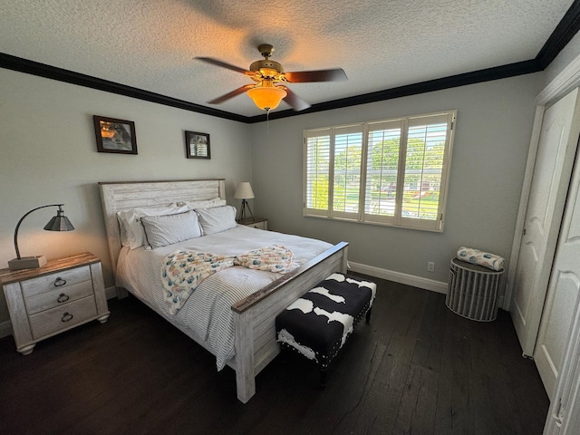 14324 Paddock Dr, Wellington, FL 33414 - bedroom with crown molding, a textured ceiling, dark wood-type flooring, baseboards, and ceiling fan