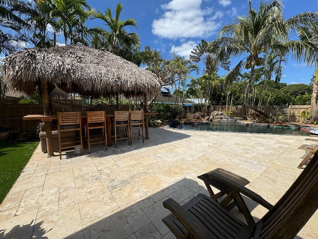 14324 Paddock Dr, Wellington, FL 33414 - view of patio / terrace with a fenced backyard and a gazebo