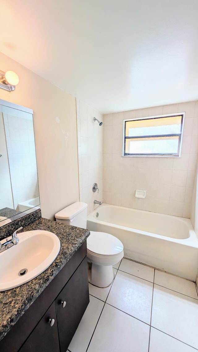 4061 N Dixie Hwy Unit 3, Oakland Park, FL 33334 - bathroom featuring vanity, toilet,  shower combination, and tile patterned flooring