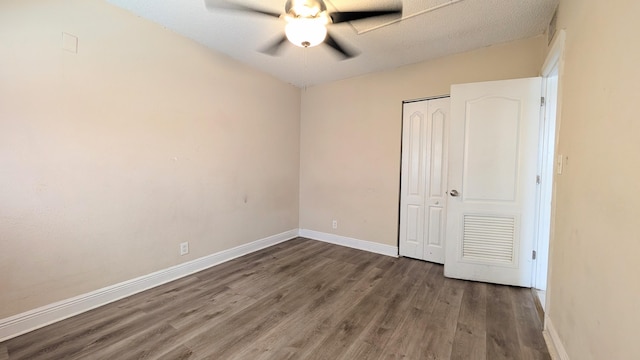 4061 N Dixie Hwy Unit 3, Oakland Park, FL 33334 - unfurnished bedroom with wood finished floors, baseboards, a closet, and ceiling fan