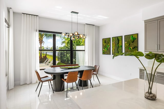 8294 Fishhawk Falls Ct, Boca Raton, FL 33496 - dining area with a chandelier and baseboards