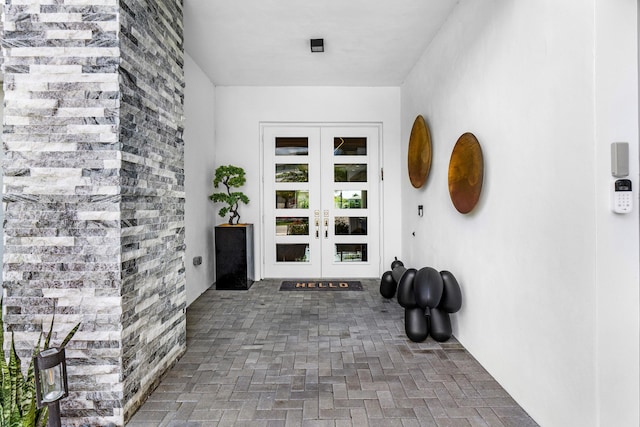 8294 Fishhawk Falls Ct, Boca Raton, FL 33496 - doorway to property featuring french doors and stucco siding
