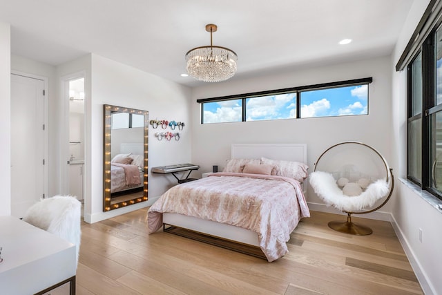 8294 Fishhawk Falls Ct, Boca Raton, FL 33496 - bedroom featuring a chandelier, light wood finished floors, recessed lighting, and baseboards