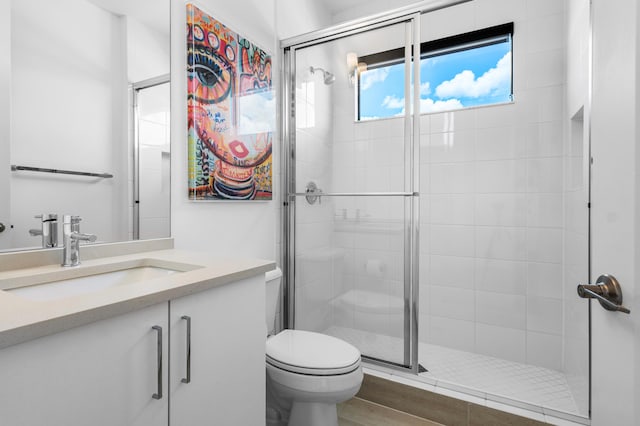 8294 Fishhawk Falls Ct, Boca Raton, FL 33496 - bathroom with a shower stall, toilet, and vanity