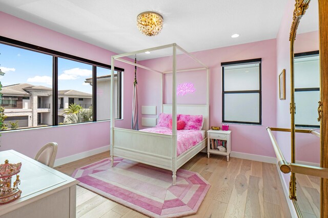 8294 Fishhawk Falls Ct, Boca Raton, FL 33496 - bedroom featuring baseboards, wood-type flooring, recessed lighting, and a chandelier