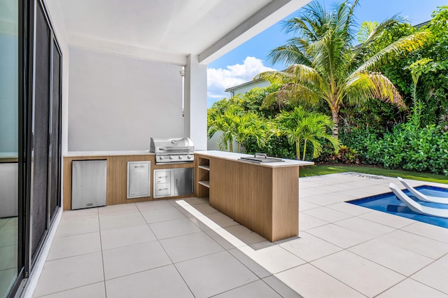 8294 Fishhawk Falls Ct, Boca Raton, FL 33496 - view of patio / terrace featuring grilling area and an outdoor kitchen