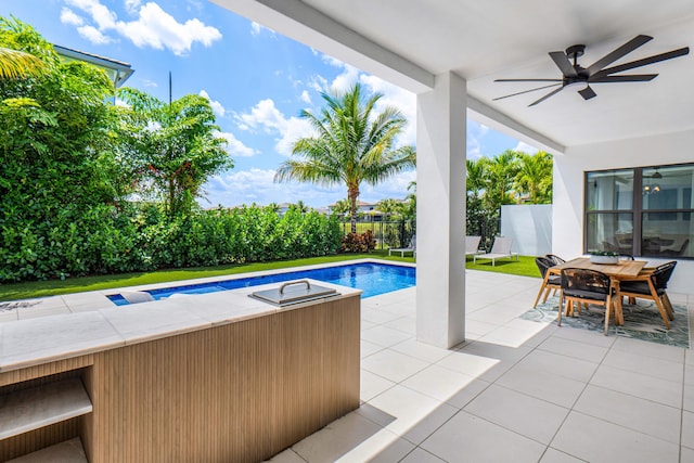 8294 Fishhawk Falls Ct, Boca Raton, FL 33496 - view of pool with a ceiling fan, a patio, fence, and outdoor dining area