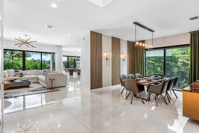 8294 Fishhawk Falls Ct, Boca Raton, FL 33496 - dining space with healthy amount of natural light, a chandelier, baseboards, and recessed lighting
