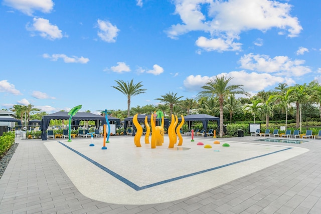 8294 Fishhawk Falls Ct, Boca Raton, FL 33496 - view of play area with a gazebo, a water play area, fence, and a community pool