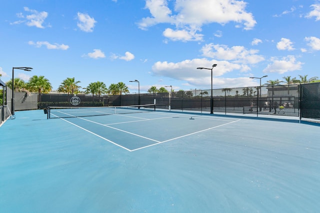8294 Fishhawk Falls Ct, Boca Raton, FL 33496 - view of tennis court featuring fence