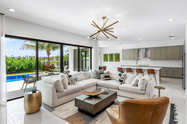8294 Fishhawk Falls Ct, Boca Raton, FL 33496 - living area featuring light tile patterned flooring, a chandelier, and recessed lighting