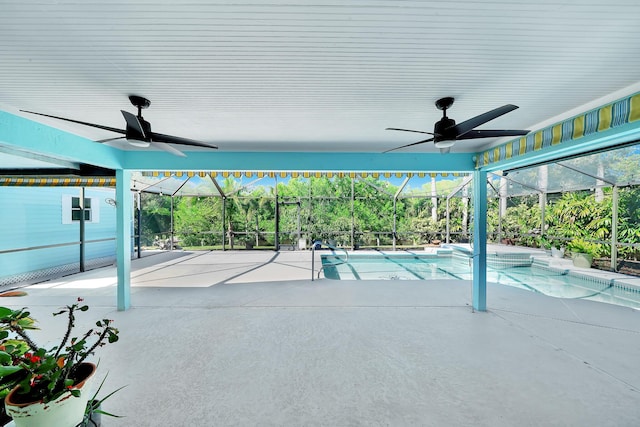 139 NE Royce Ave, Port Saint Lucie, FL 34983 - view of patio / terrace with ceiling fan, glass enclosure, an outdoor pool, and a jacuzzi