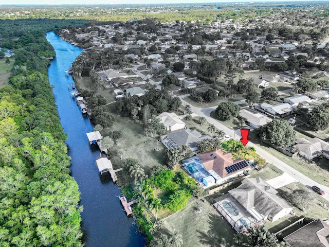 139 NE Royce Ave, Port Saint Lucie, FL 34983 - aerial perspective of suburban area featuring a nearby body of water