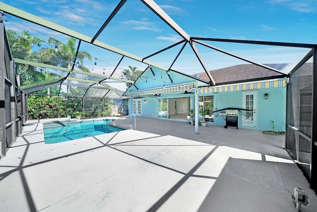 139 NE Royce Ave, Port Saint Lucie, FL 34983 - outdoor pool with a patio area and a lanai
